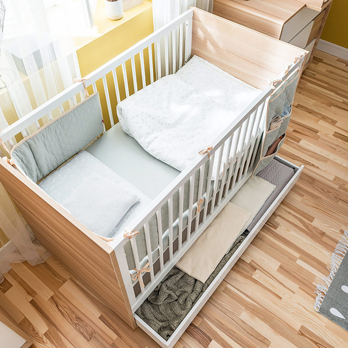 Детска кошара с подвижна решетка 70X140 Evolve (Baby) – дъб/бял